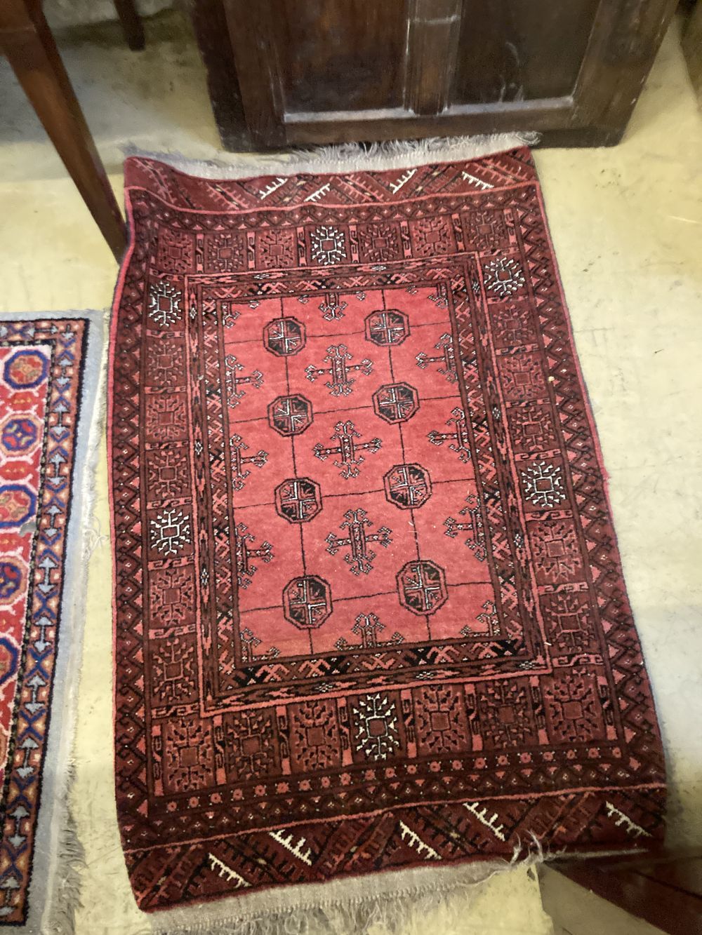 A Caucasian design rug, 150 x 94cm together with a smaller Chinese rug and a small Bokhara rug